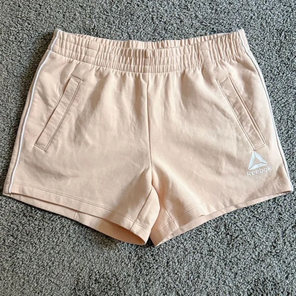Reebok Women's Light Cream/Peach Athletic Shorts